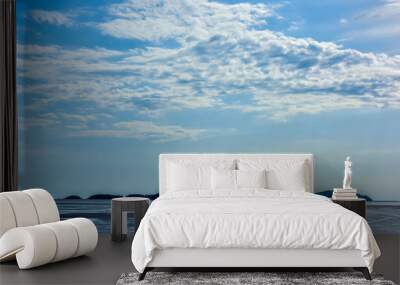 In summer, beautiful coastline and island scenery in cloudy background. Wall mural