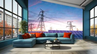 The power transmission tower and solar panel of the power station are energy-saving concepts. Sunset background Wall mural