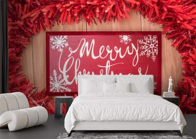 Merry christmas text and Christmas decorations on a wooden backg Wall mural