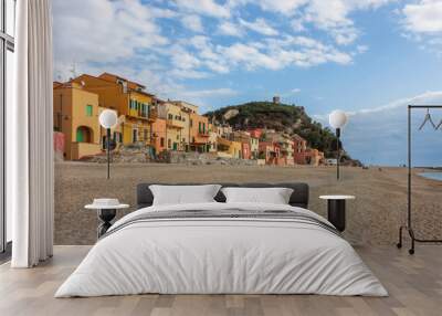 a view of the colorful houses and the beach of the village of Varigotti, in the province of Savona. Wall mural