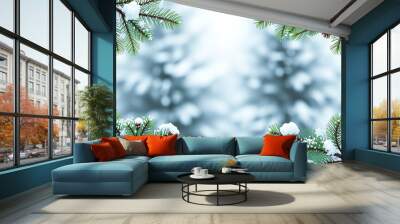 Snowy winter background with fir branches and copy space for text Wall mural