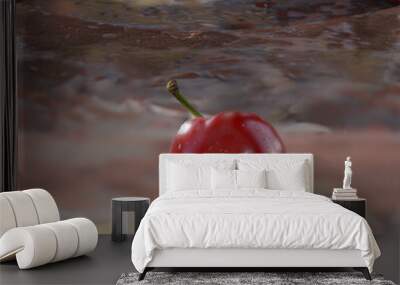 there are many cherries that are on a table with a red background Wall mural