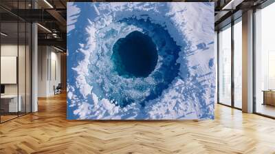 Aerial view of ice cave in the snow Wall mural