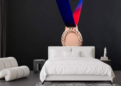 Blank bronze medal on black background Wall mural