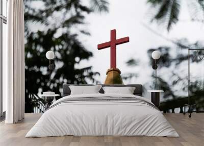 Cross on the roof of church Wall mural