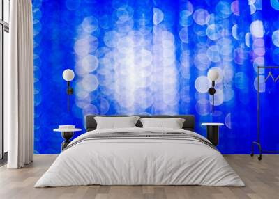 Defocused lights with white and blue bokeh for Christmas background Wall mural