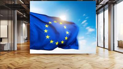 European Union flag waving against blue sky background Wall mural