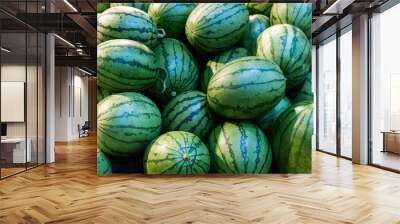 Pile of fresh watermelons in market Wall mural