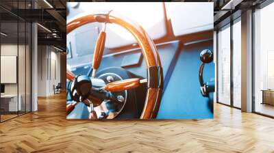 Steering wheel on luxury yacht Wall mural