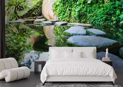 Stepping stones path over a pond Wall mural