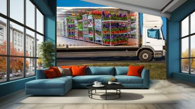 truck delivered flowers in pots, transport logistics in Europe Wall mural