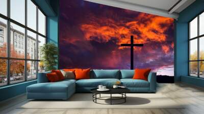 Wooden cross against sky background   , Easter background. Christian cross against celestial clouds.  Wall mural