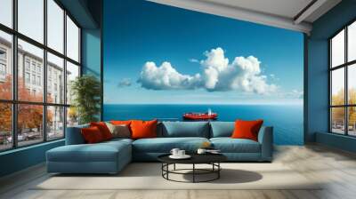 Cargo Ship on the Ocean Under a Blue Sky with White Clouds Wall mural