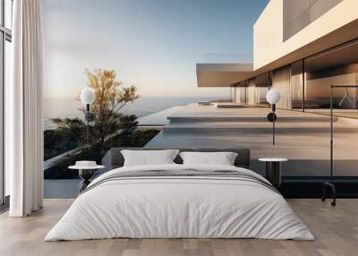 Minimalist luxury living architecture with concrete and glass, overlooking the ocean under a sunny clear sky. Wall mural