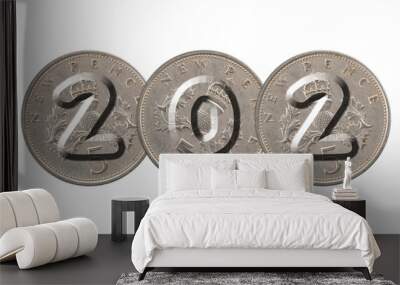 Number 202  with old coins on white background Wall mural