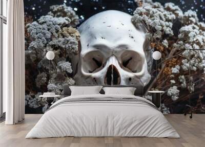 skull with dried flowers. Wall mural