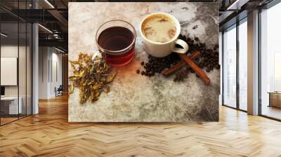 Hot coffee and hot tea with beans and tea leaves. Wall mural