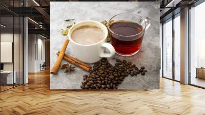 Hot coffee and hot tea with beans and tea leaves. Wall mural