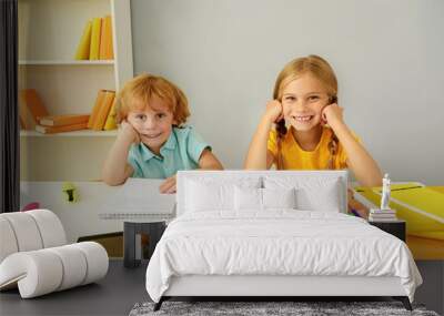 adorable happy kids sitting in elementary school Wall mural