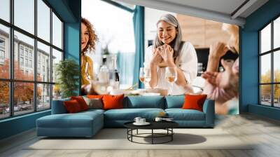 Adult woman very happy with a gift from friends Wall mural