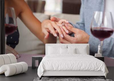 Cheerful young loving couple is betrothing themselves  Wall mural