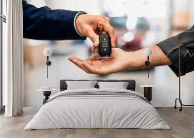 Customer putting an electronic device on a mechanics palm Wall mural