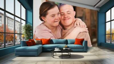 Girl with special needs embracing tight her boyfriend with colored hair Wall mural