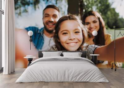 Happy family is spending summer weekend together Wall mural