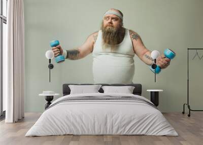 man exercising with weights Wall mural