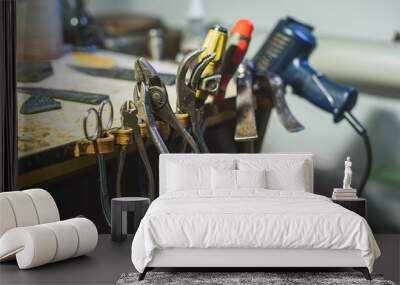 metallic tools on a table Wall mural