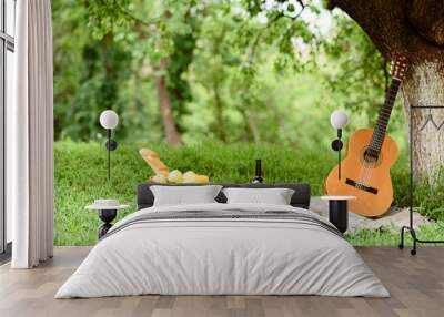 Musical instrument with elegant drink in nature Wall mural