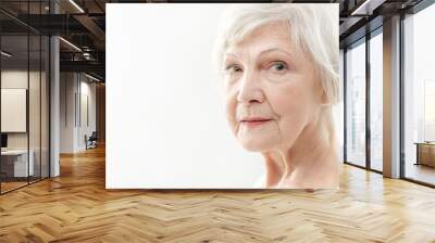 Serine senior lady with wrinkles on face Wall mural