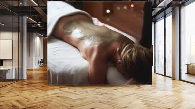 Top angle of young lady on healthy mud procedure Wall mural