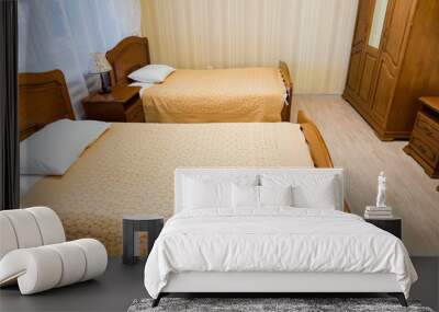 Interior of modern economy hotel room with twin beds in beige colour Wall mural