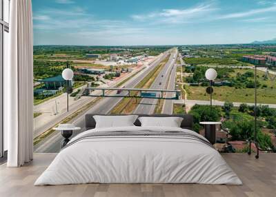 aerial top view photo of modern industrial zone settled by the highway Wall mural