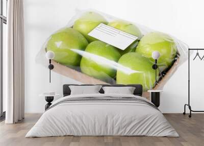 packed and labeled green apple on isolated white background Wall mural