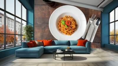 Spaghetti with bolognese sauce on a white porcelain plate Wall mural