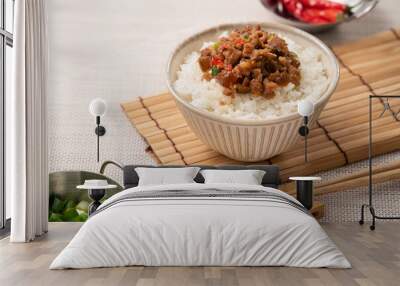 Taiwanese fried minced pork with pickled cucumber on rice named GUA ZI ROU FAN. Wall mural