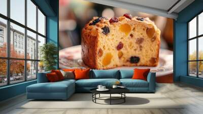 Freshly baked fruitcake served on a decorative plate in a cozy cafe during the afternoon Wall mural