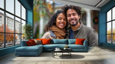 mixed race couple standing together in front of a house Wall mural