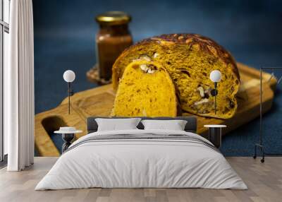 Pumpkin bread on the wooden serving board Wall mural