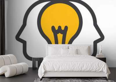 Two profiles and between them a light bulb, a symbol of teamwork and the birth of new ideas. Wall mural