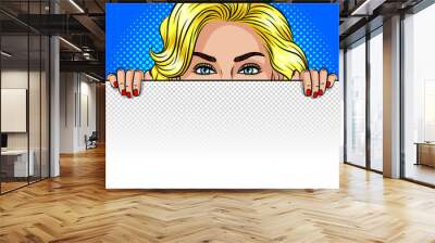 Color vector pop art style illustration of a girl peeking from behind a white sheet. A woman is hiding behind a white board. A beautiful girl is holding a poster with empty space for text. Wall mural