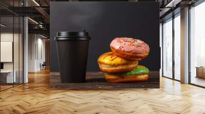 Colorful donuts and coffee in a black paper Cup on a black background. Bakery menu design concept. Hanukkah background. Wall mural