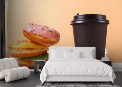 Takeaway coffee and doughnuts,a quick snack along the way. Concept of serving takeaway food for a coffee shop or bakery Wall mural