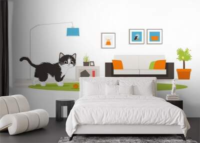 A playful kitten exploring a cozy living room, surrounded by colorful toys and inviting decor during a sunny afternoon Wall mural