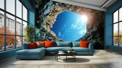 Looking Beyond: Earth as seen from a mysterious cave, a conceptual piece of art illustrating nature and space Wall mural