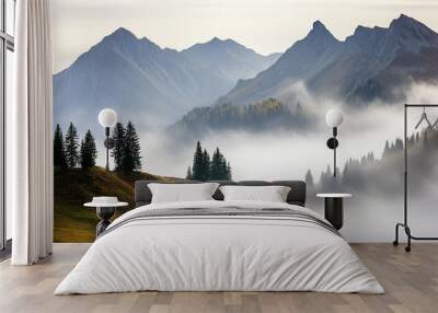 Majestic misty mountains at dawn with evergreen trees illuminated by soft light in a serene landscape Wall mural