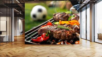 Summer outdoor barbecue with grilled steaks and football match Wall mural