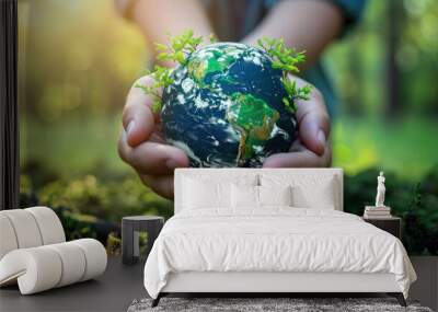 green planet earth with nature and trees in hands Wall mural